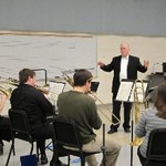 Curtis Olson conducting trombone ensemble.